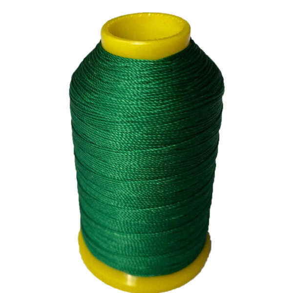 binding thread for oboe and bassoon in dark green on white background