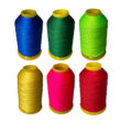 reed binding thread colours lined up on white background