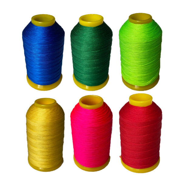 reed binding thread colours lined up on white background