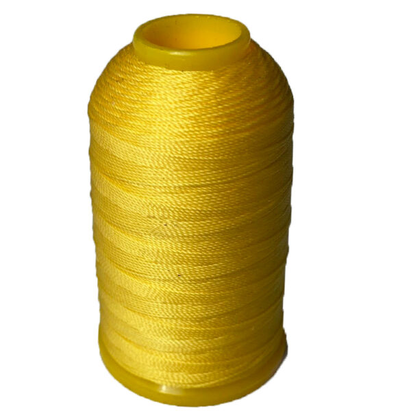 binding thread for oboe and bassoon in yellow on white background