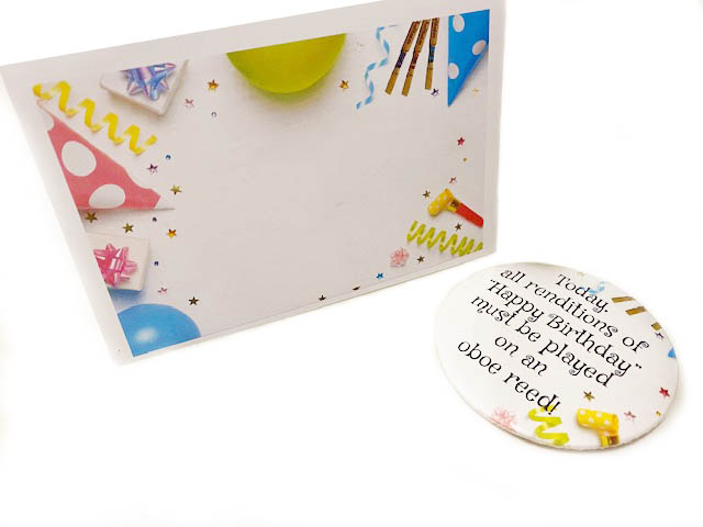 Happy birthday oboe reed badge and card on white background sep