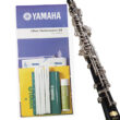 oboe maintenance kit shown with oboe alongside on white background