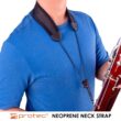 torso of man wearing blue tshirt holding a bassoon connected to neoprene less-stress neckstrap by protec